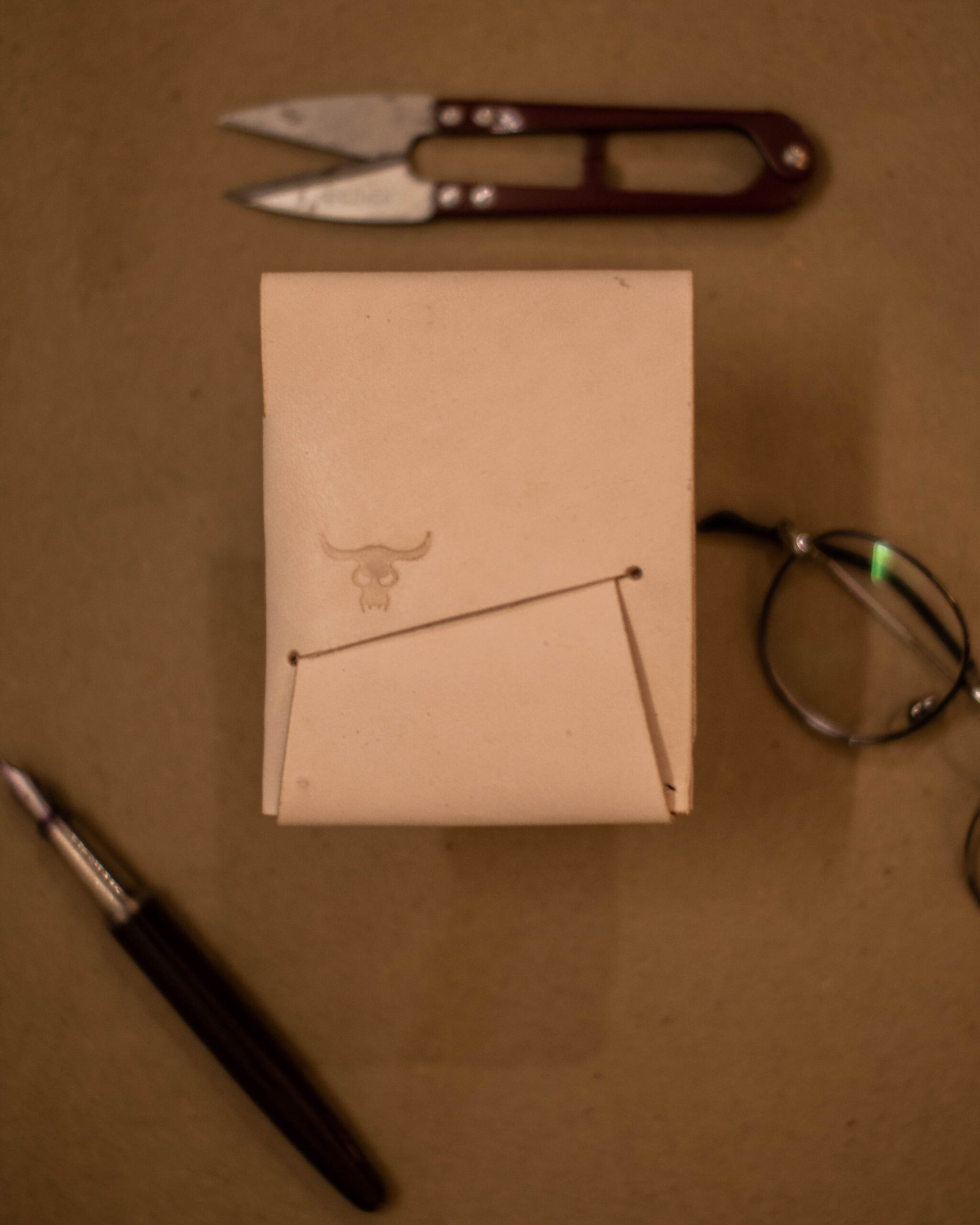 Alabaster Trifold Tucker Wallet
